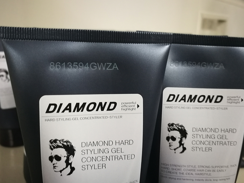 Fiber laser marking on a plastic facial cleanser bottle